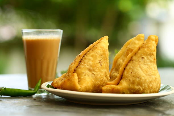 Explore the rich heritage and art of making samosas. Discover international twists and street food sensations. Embrace the enduring allure of this delectable Indian appetizer.